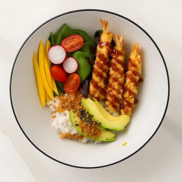 Japanese tempura shrimp bowl with rice, avocado, mango, radishes, tomatoes, and greens.